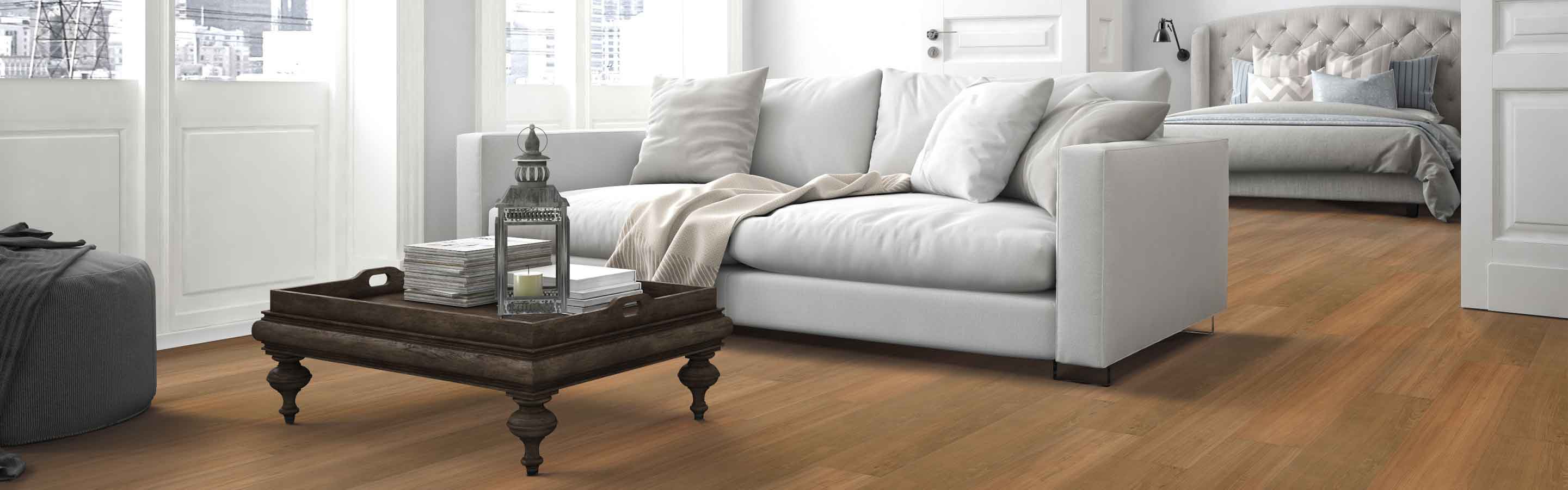 wood look vinyl in open concept living room bedroom ensuite with neutral colorways